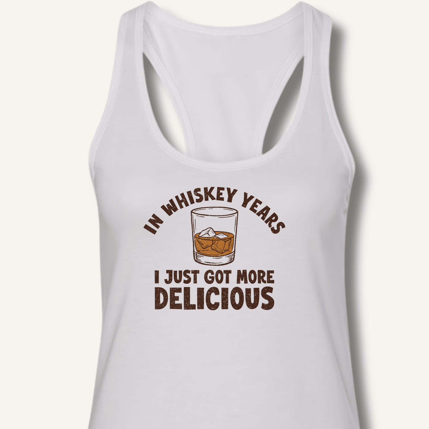 In Whiskey Years I Just Got More Delicious Racerback Tank - Sip & Shirt