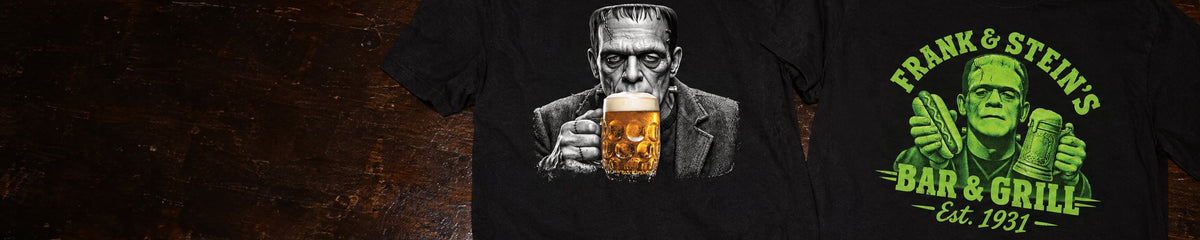 Frankenstein Drinking Beer and Frank & Stein's Bar & Grill t-shirts laid on a Halloween bar top next to two pints of beer